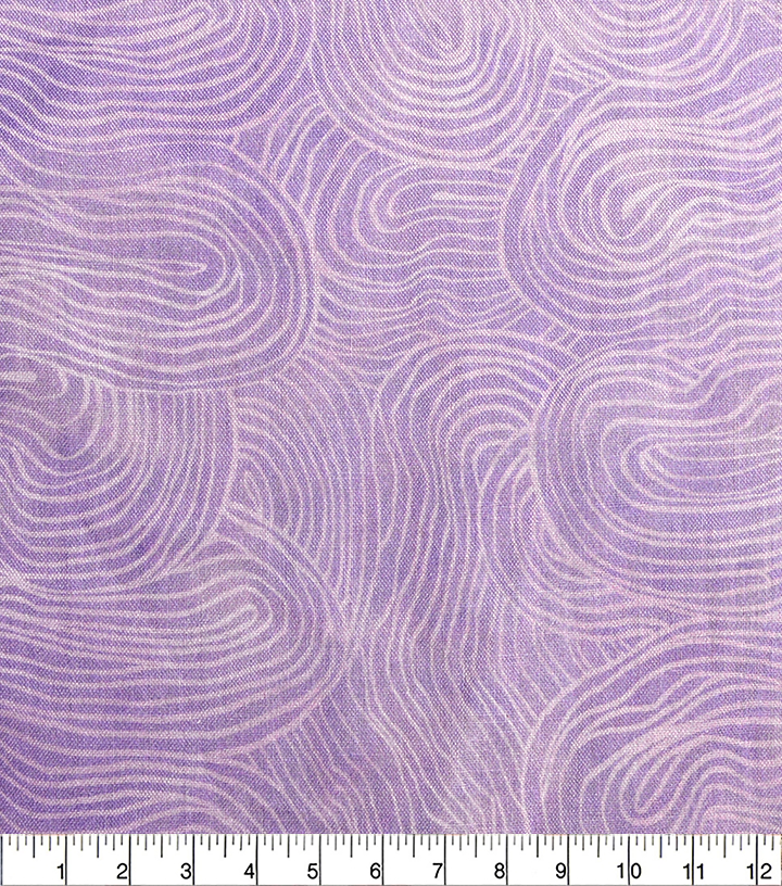 Wavy pattern fabric swatch on a purple background with a ruler at the bottom.