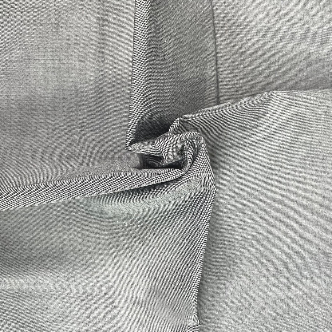 Close-up of gray fabric with a subtle pattern