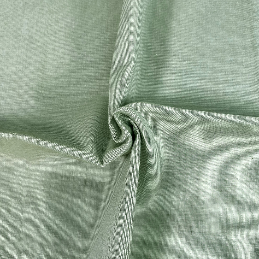 Close-up of green fabric with a slight texture