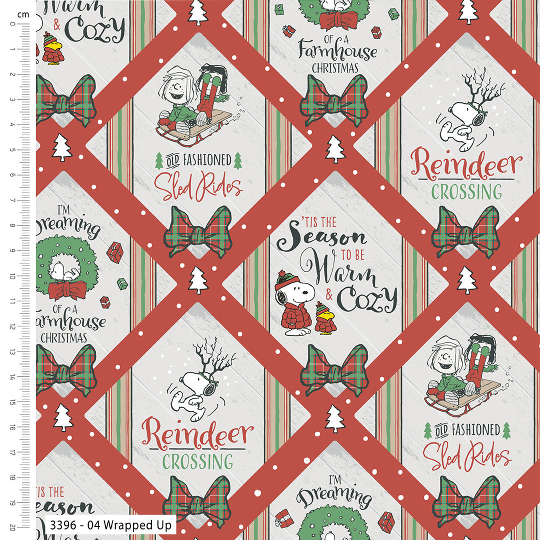 Christmas-themed fabric with Snoopy and Woodstock designs, featuring text and patterns on a grid.