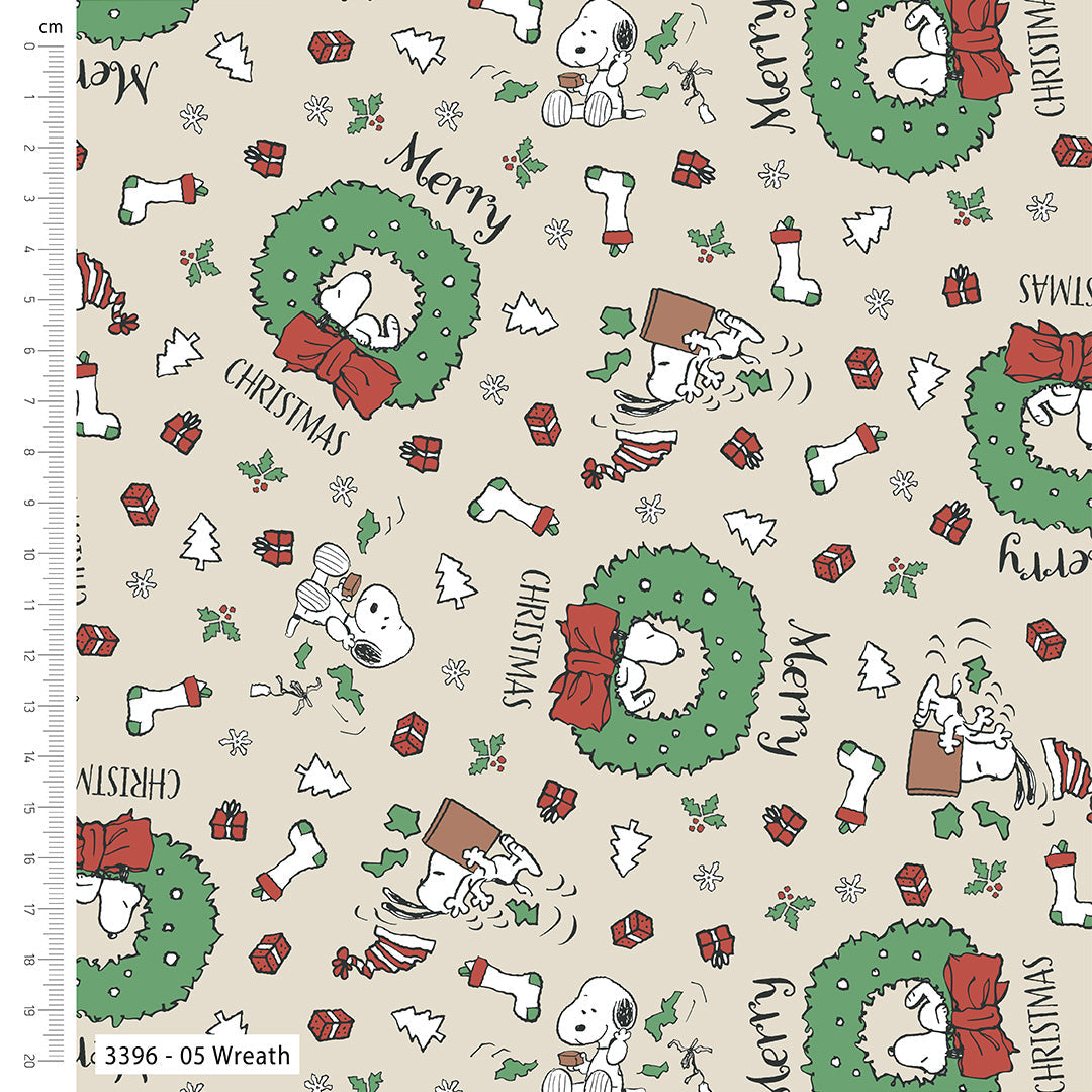 Christmas-themed fabric with Snoopy and Woodstock designs on a beige background.