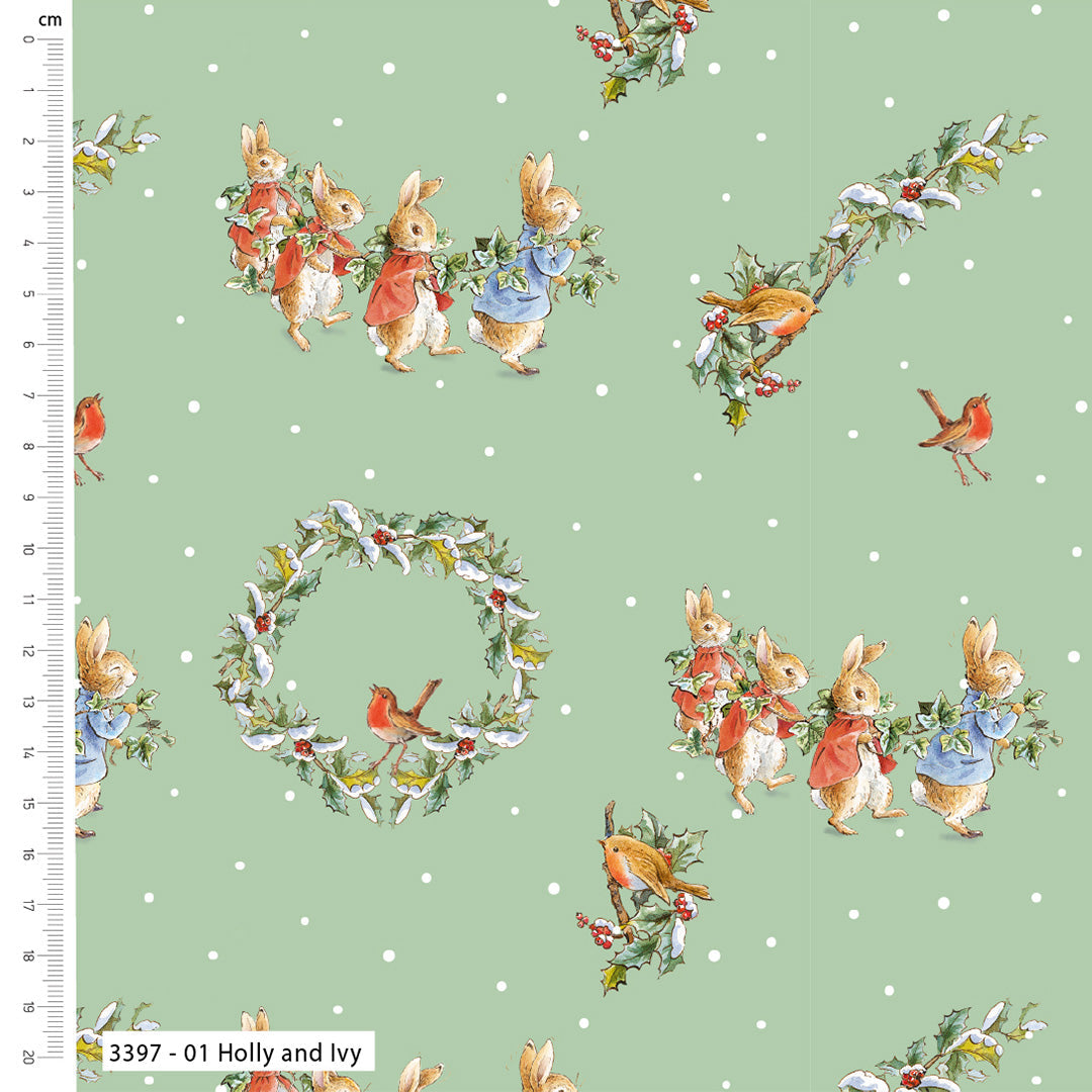 Fabric with festive design featuring rabbits, birds, and holly leaves on a green background.
