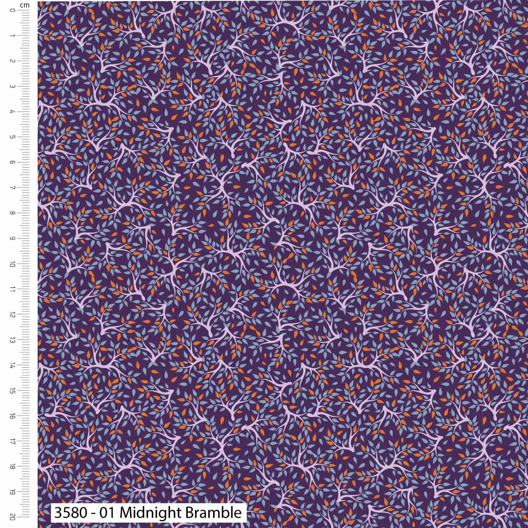 Fabric swatch with a pattern of branches and leaves on a purple background, with a ruler for scale.