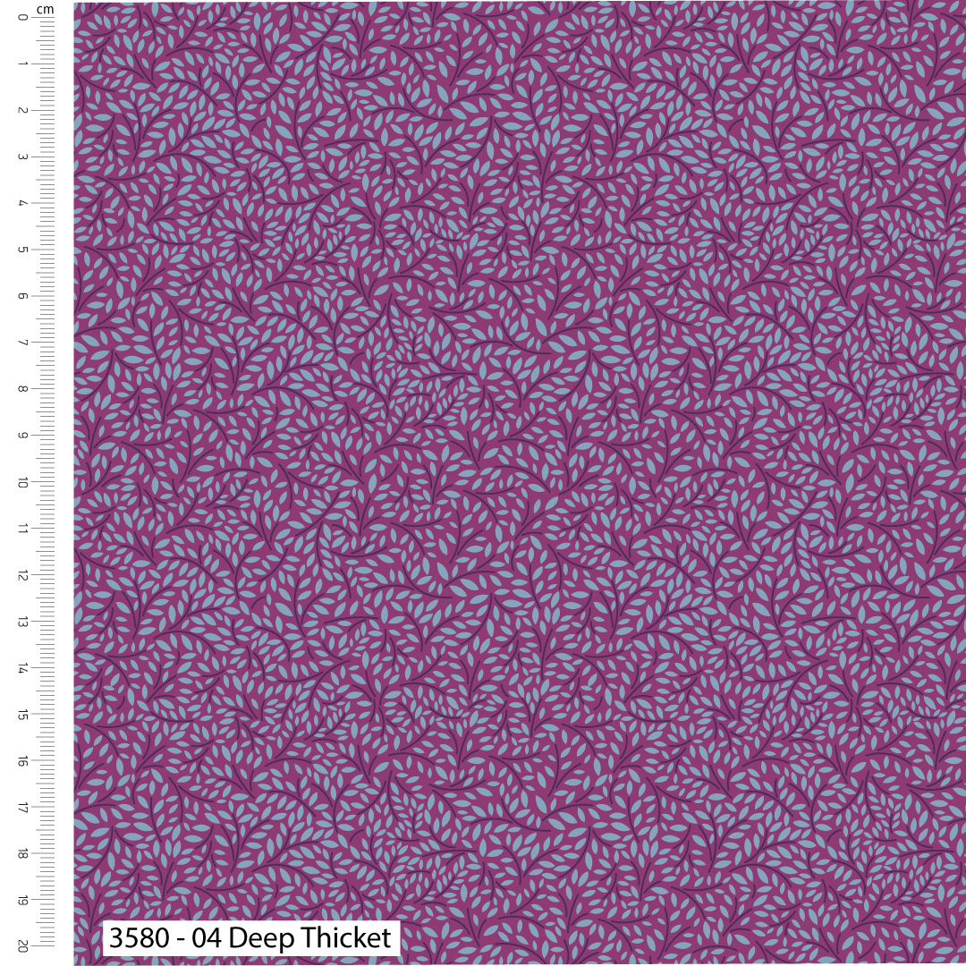 Purple fabric with a subtle pattern and a ruler for scale on the side.