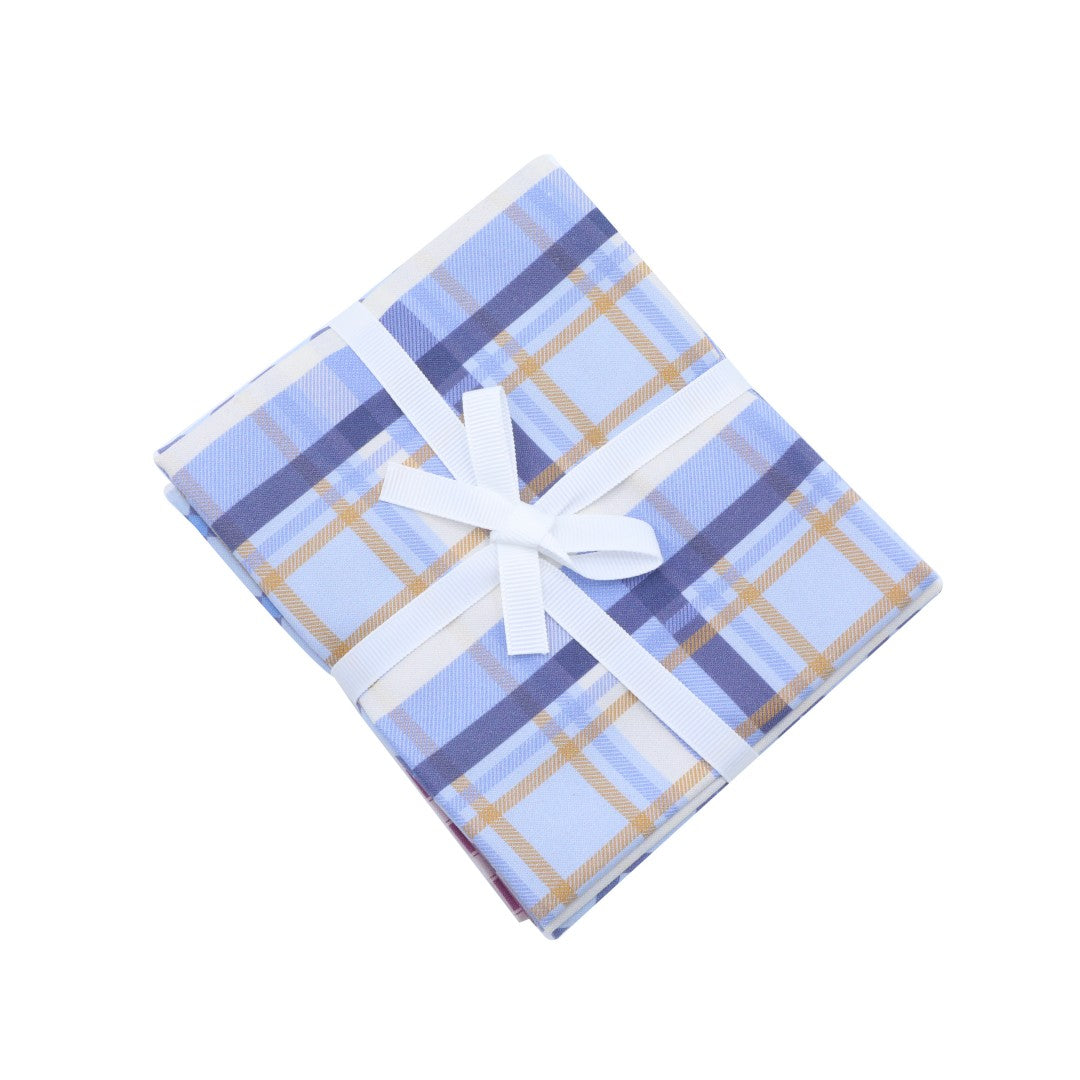 Plaid fabric with a white bow on a white background