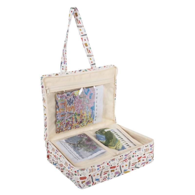 Interior of Haby Notions Craft Bag showing transparent pockets, elastic loops, and space for yarn