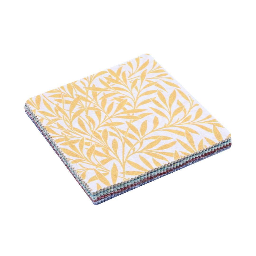 Set of three notebooks with yellow leaf pattern on a white background