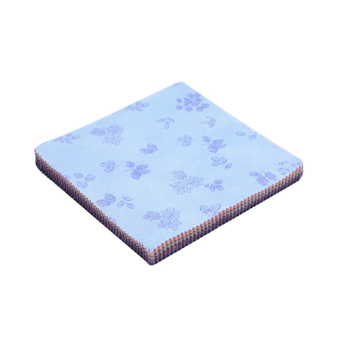 Blue pet bed with paw print pattern on a white background