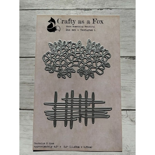 Metal die cut shapes on a 'Crafty as a Fox' branded card with text.