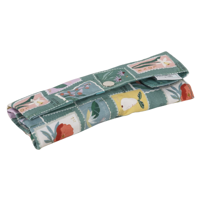 Embroidered Stamps Crochet Wrap Case, closed with popper fastening showing stamp print