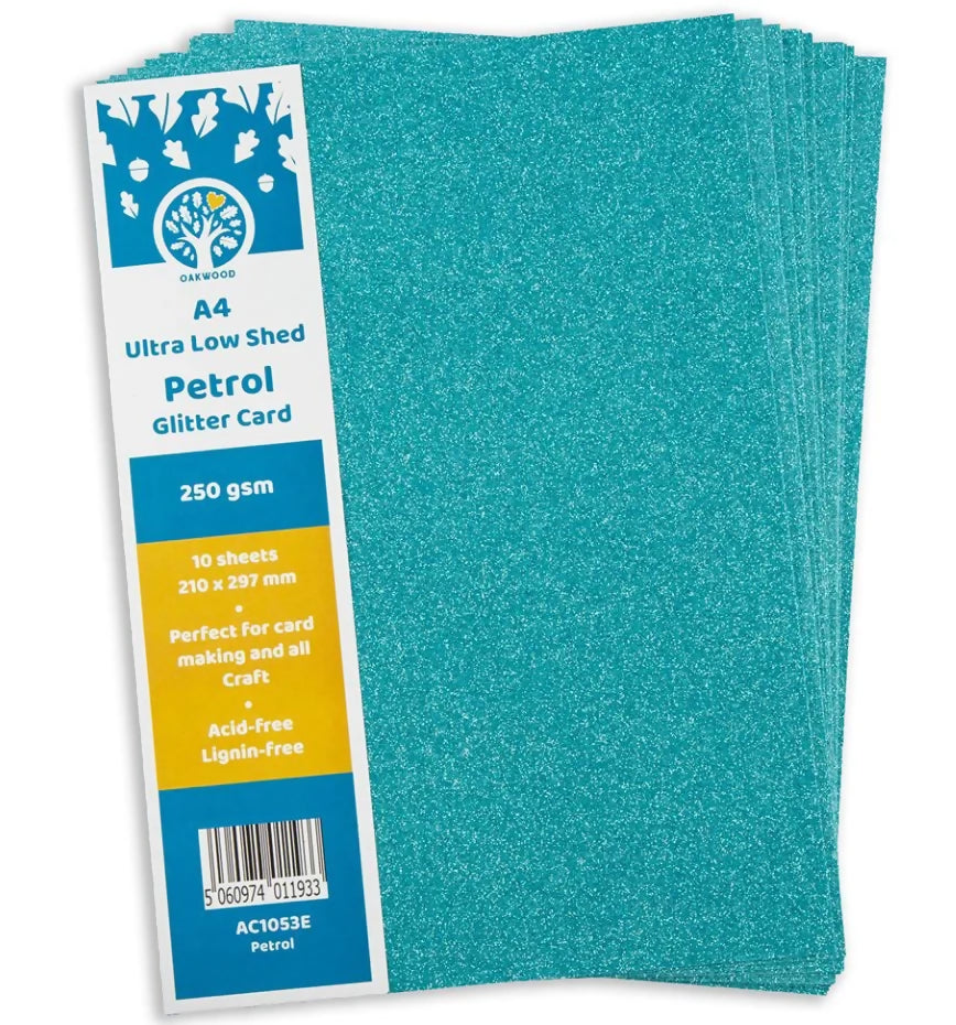 Turquoise glitter card with packaging on a white background