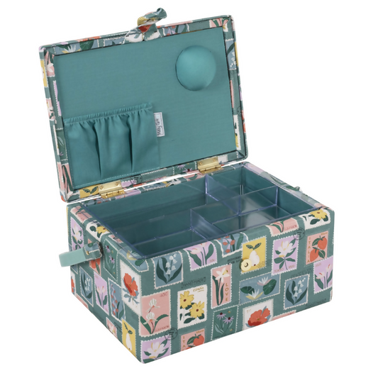 Medium Embroidered Stamps Sewing Box, open, revealing internal plastic tray, pincushion, and pocket