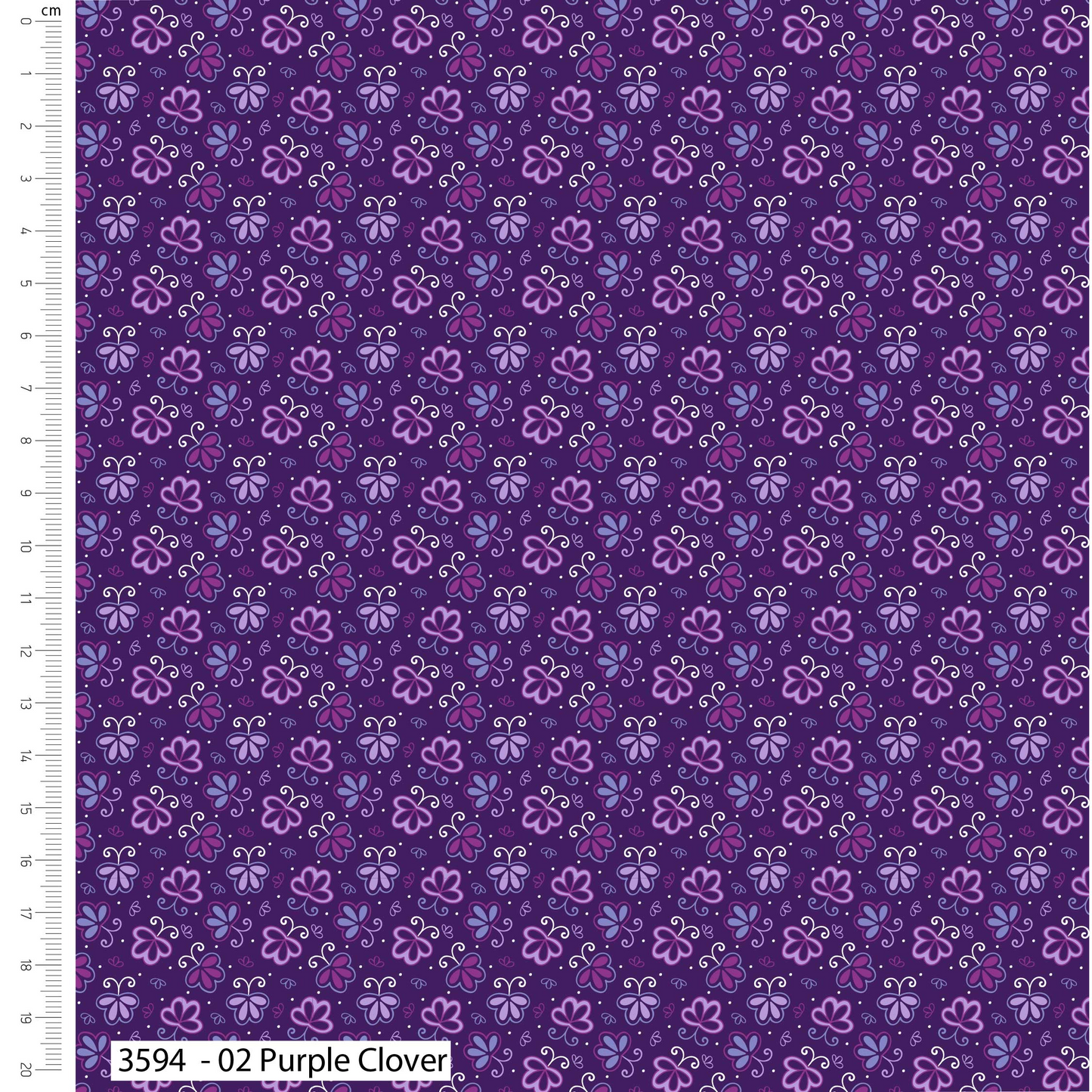 Purple fabric with floral pattern and ruler for scale