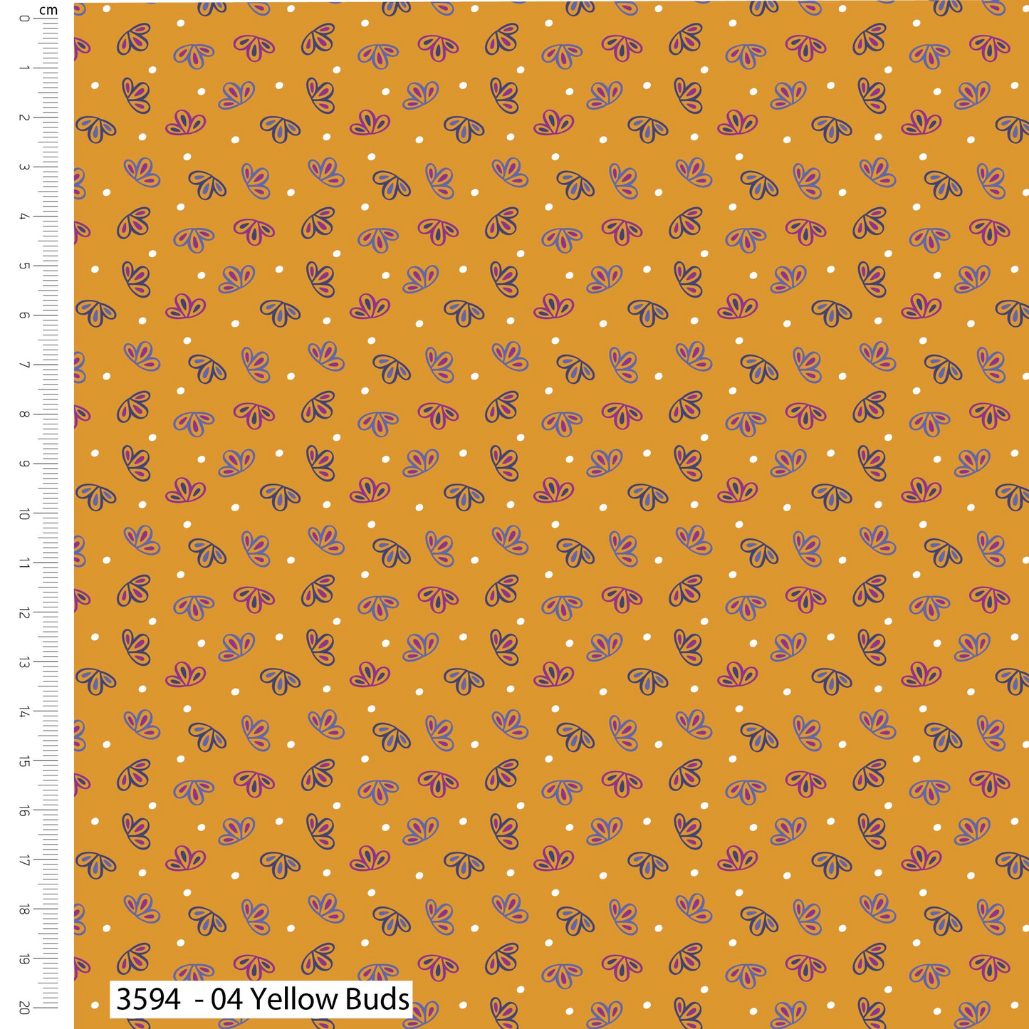 Patterned fabric with small white dots and purple shapes on a yellow background, with a ruler for scale.