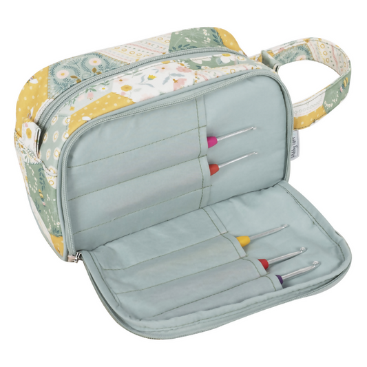 Patchwork Bee Crochet Bag, open, revealing internal elastic loops for hooks and spacious interior