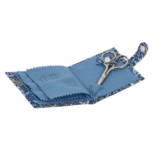 Woodblock Floral Needle and Scissors Case, open, revealing felt pages, included needles, pins, and small scissors