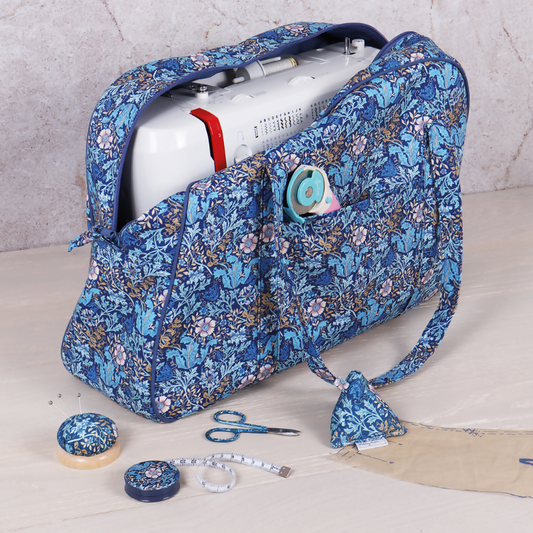 Woodblock Floral Sewing Machine Bag open with a sewing machine securely placed inside