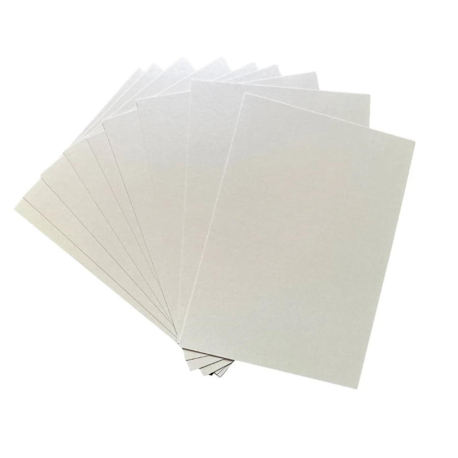 Stack of white cardstock sheets on a white background