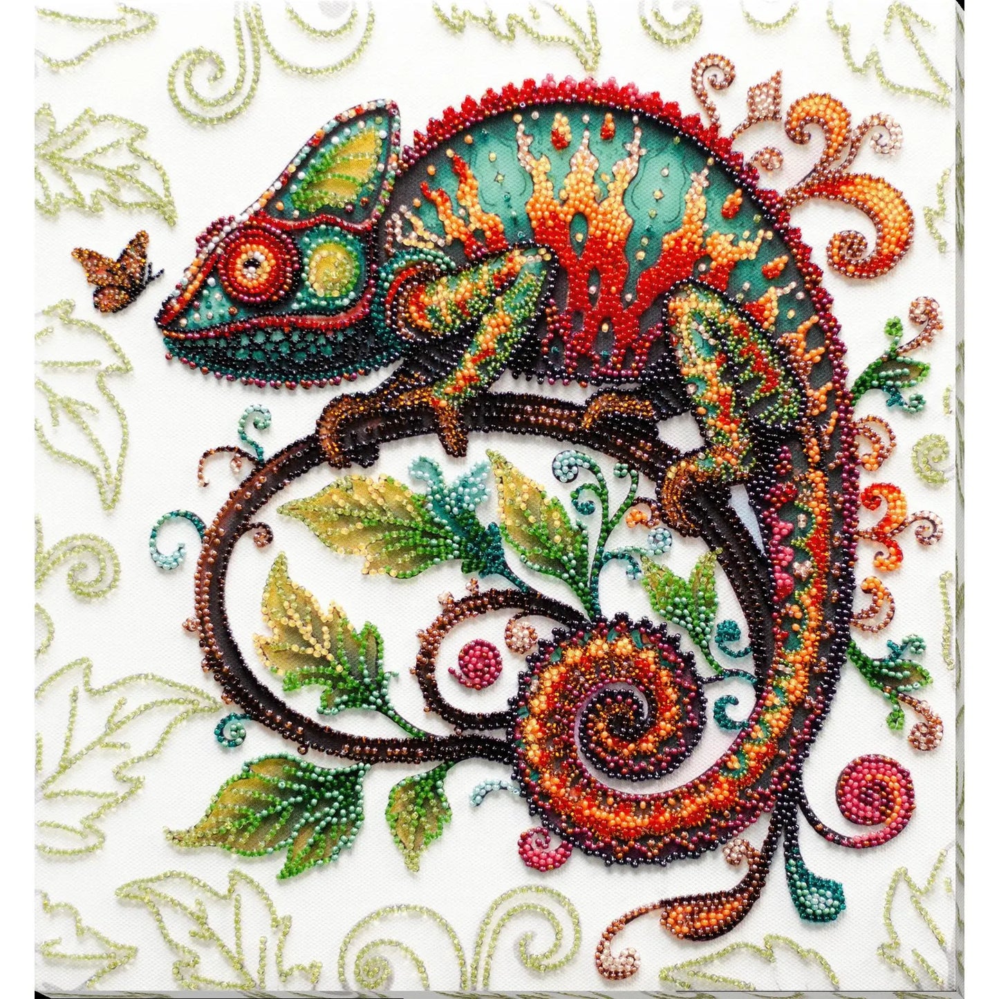 Colorful beaded chameleon on a decorative background