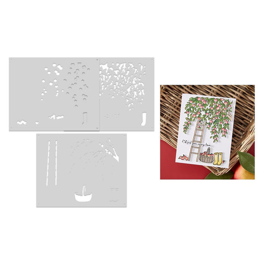 Two stencils with cut-out patterns and a printed card with a garden scene.