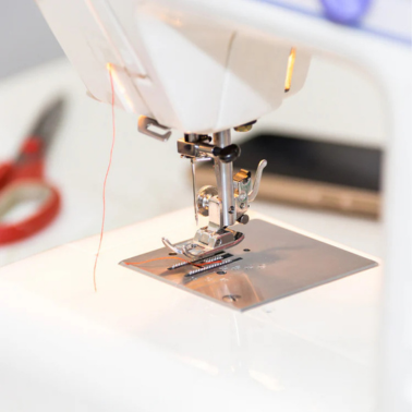 Close up of sewing machine foot