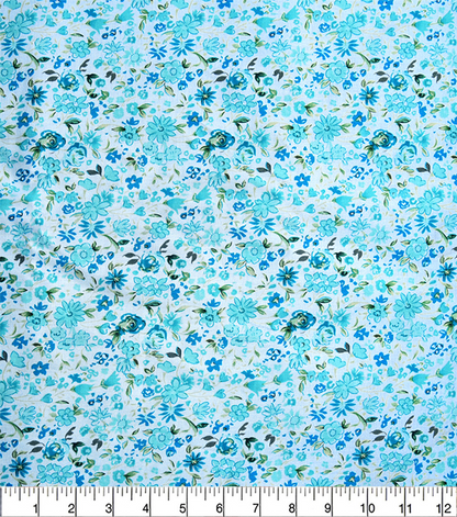 Blue floral pattern fabric with a ruler for scale