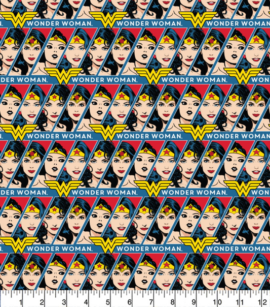 Pattern of Wonder Woman's face and logo on a red background with a ruler at the bottom.