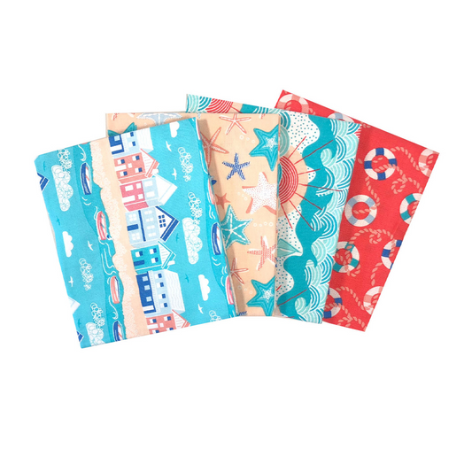 Four colorful fabric swatches with beach-themed patterns on a white background