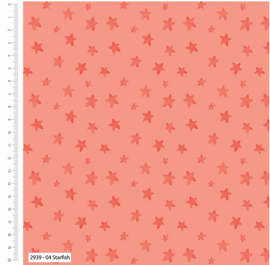 Fabric with starfish pattern on a coral background, measured with a ruler on the side.