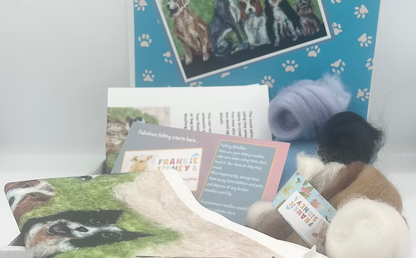 Collection of pet-themed products including a pillow, cards, and a plush toy on a white surface.
