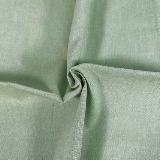 Close-up of green fabric with a slight texture