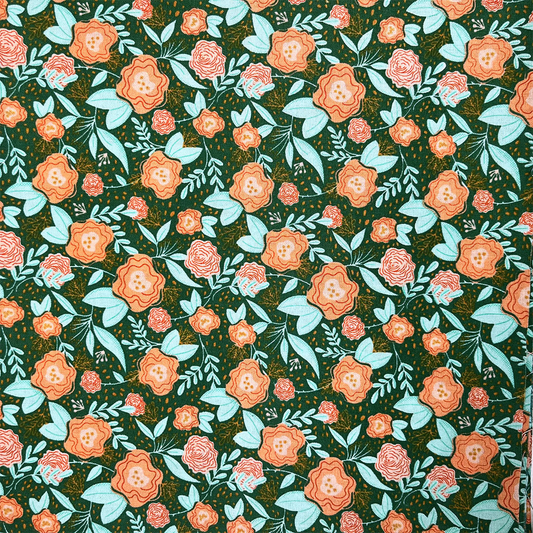 Pattern of orange flowers and green leaves on a dark background