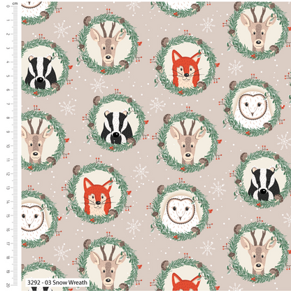 Fabric with woodland animal pattern on a beige background