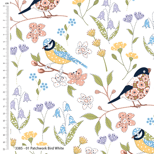 Patterned fabric with birds and flowers on a white background, featuring a ruler for scale.