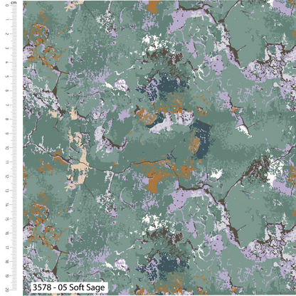 Textile swatch with a pattern of green, purple, and orange on a fabric background.