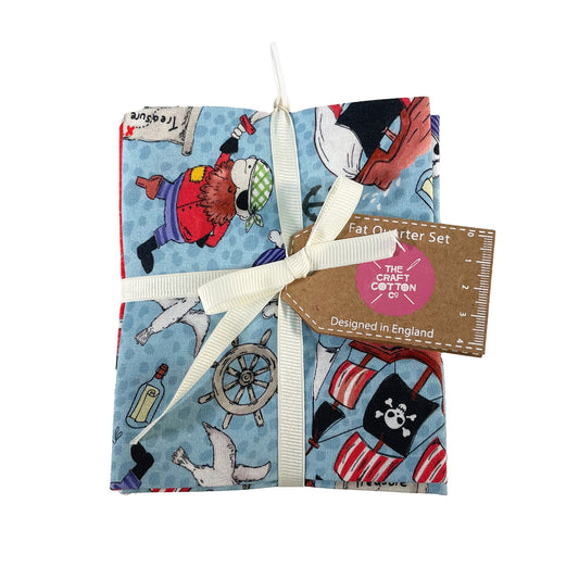 Fat quarter set with pirate-themed fabric and 'The Crafty Hen' branding on a white background