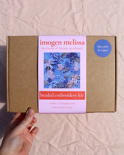 Beaded embroidery kit packaging with 'imogen melissa' branding on a beige background