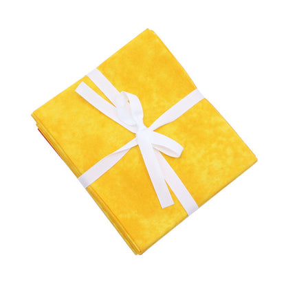 Yellow gift box with a white ribbon on a white background