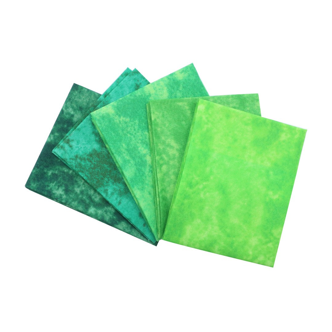 Set of green fabric swatches on a white background