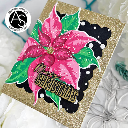 Christmas card with pink poinsettia design and 'Merry Christmas' text on a glittery gold background.