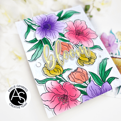 Clear stamp set with colorful floral designs and the word 'bloom' on a white background.