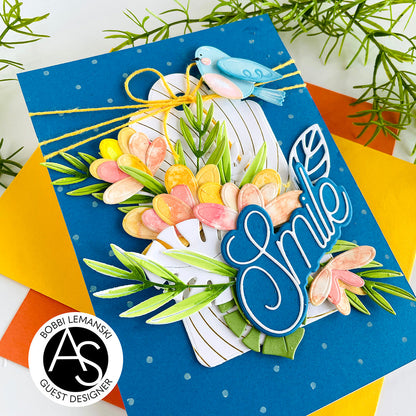Decorative card with flowers, birds, and 'Smile' text on a blue background