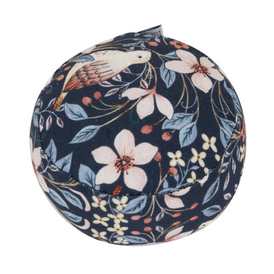 Close-up of Blossom Birds Pincushion showing fabric detail and pin insertion