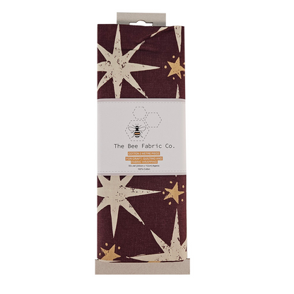 Fabric package with star pattern and 'The Bee Fabric Co.' branding on a white background