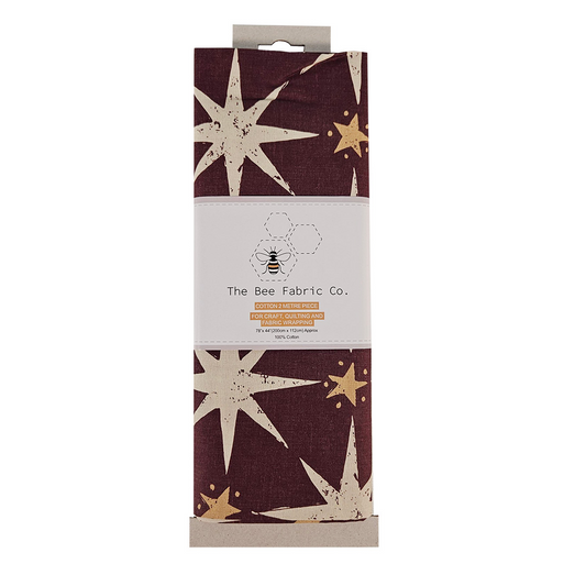 Fabric package with star pattern and 'The Bee Fabric Co.' branding on a white background