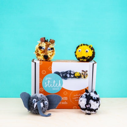 Pom-pom animals in front of a 'pom stitch' box with a blue background