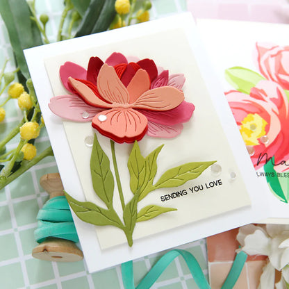 Floral card with 'Sending You Love' text, surrounded by flowers and ribbons.