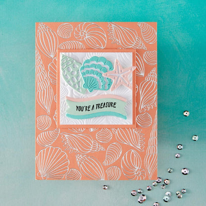 Card with seashell pattern and 'You're a Treasure' message on a teal background