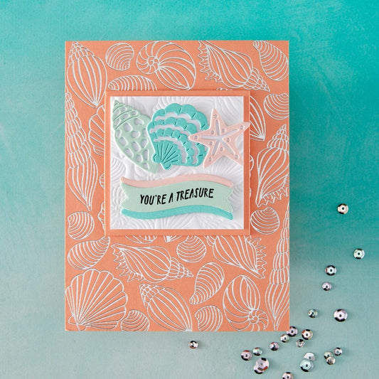 Card with seashell pattern and 'You're a Treasure' message on a teal background