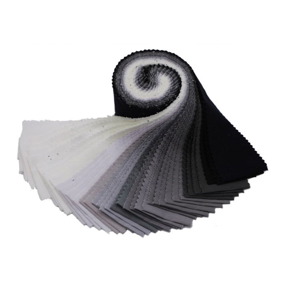 Roll of black and white fabric swatches